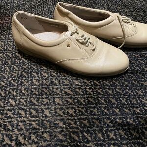 Beige leather flats